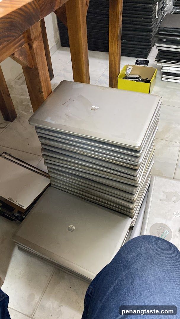 Stack of Laptops in a Shop Interior