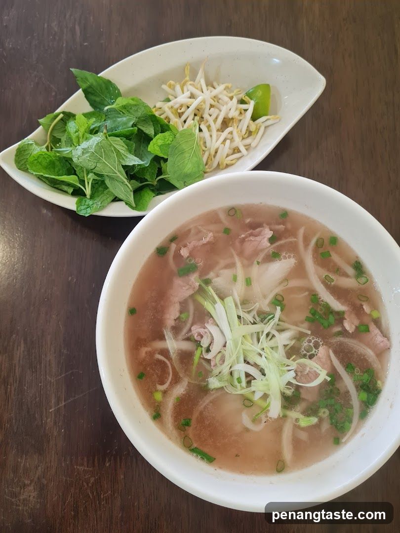 Bowl of Pho with Side Dishes