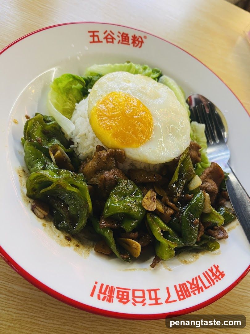 Bowl of Fish Noodle with Fried Egg