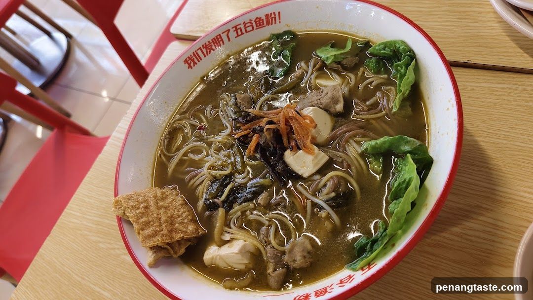 Bowl of Noodle Soup with Vegetables and Tofu