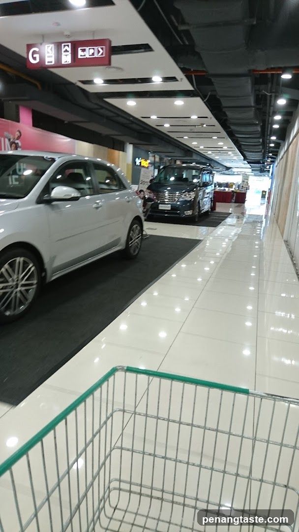 Shopping Center Interior with Cars Displayed
