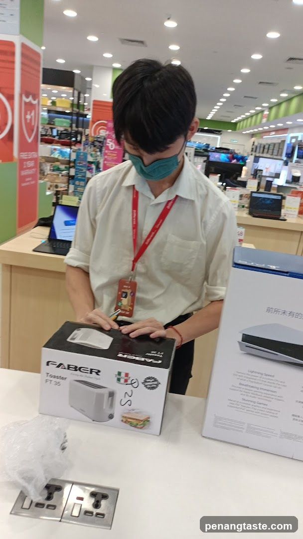 Staff Unboxing Faber Toaster in Store