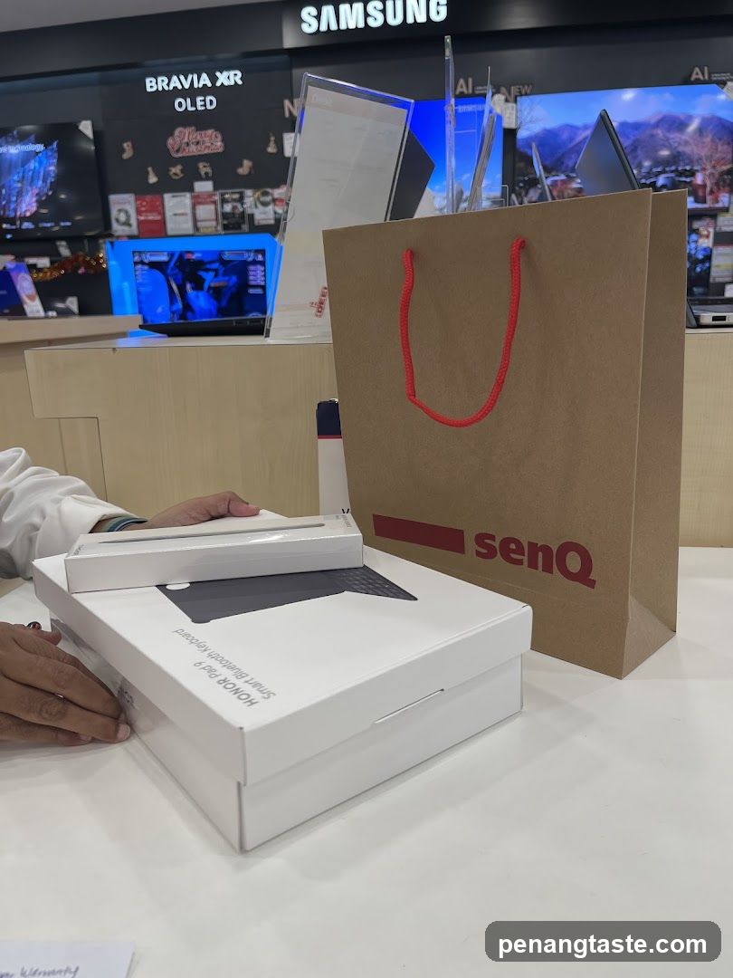 Electronics Store Interior with Shopping Bag and Product Boxes