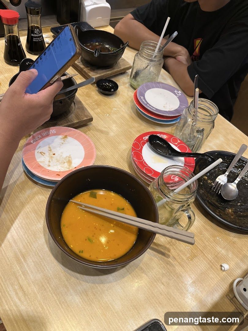 Dining Table with Soup and Utensils