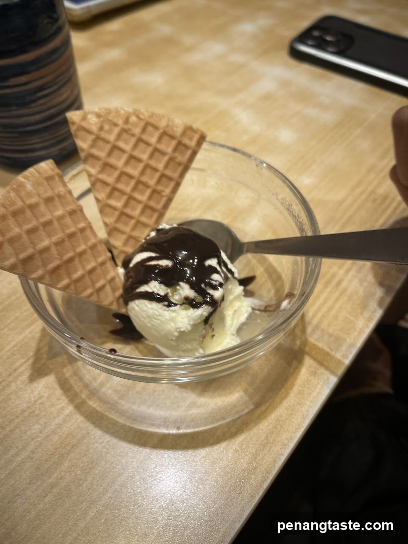 Ice Cream with Wafers and Chocolate Sauce