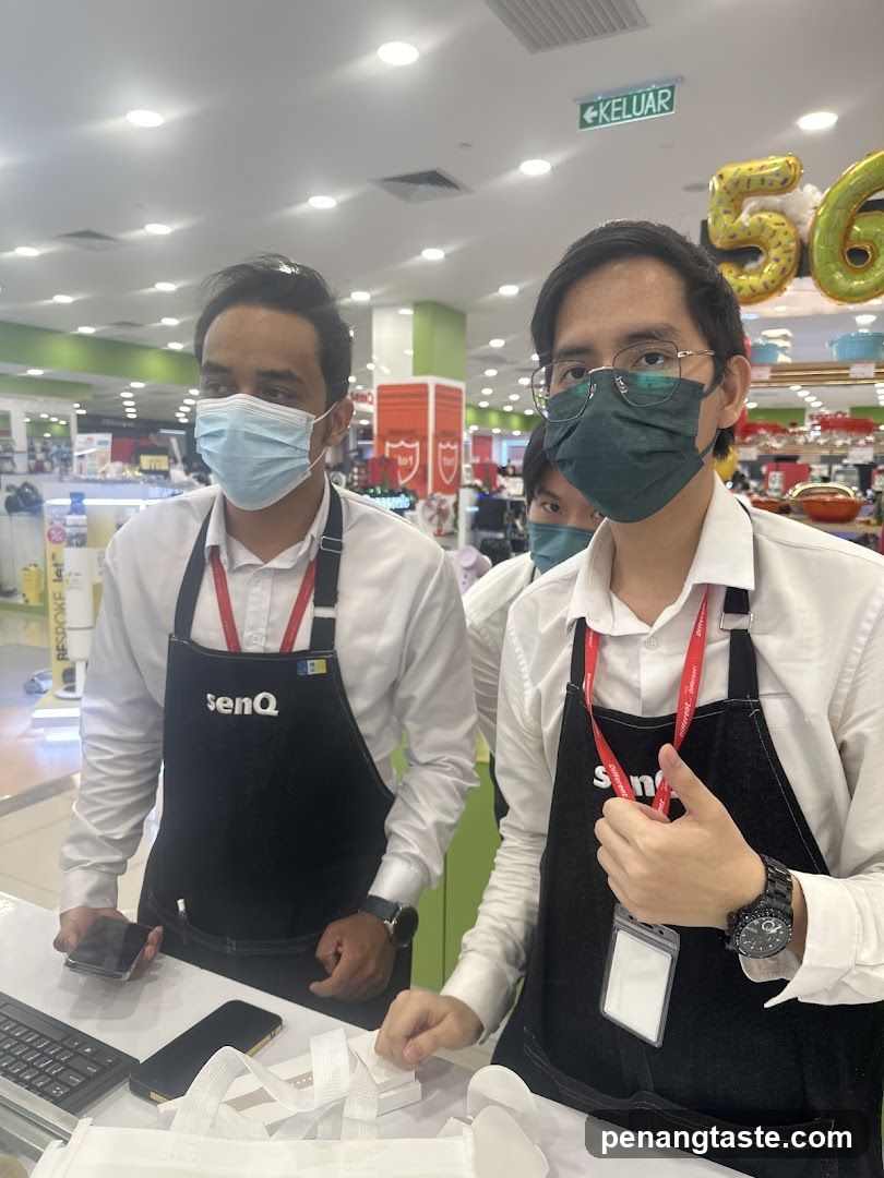 Staff at a retail counter
