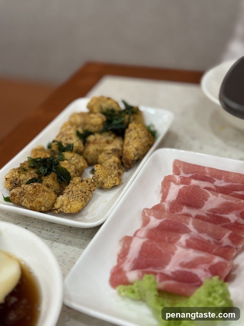 Food Platter with Fried Chicken and Sliced Meat
