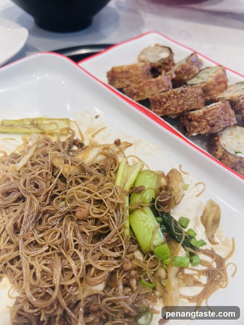 Noodles and Fried Roll Dish