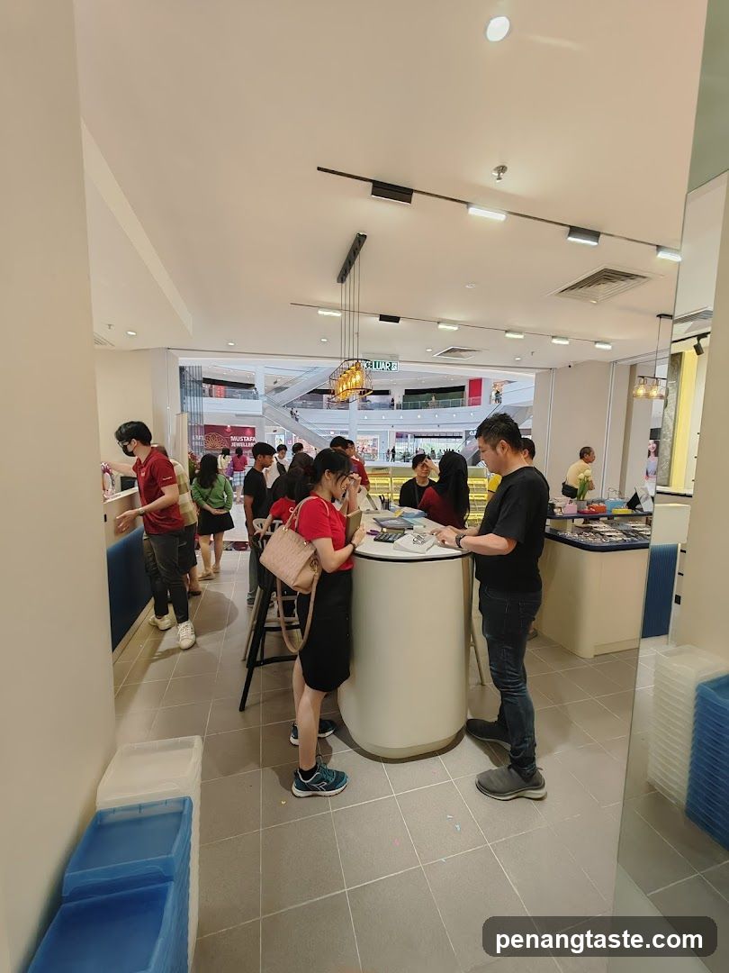 Interior of a retail store with customers at counters