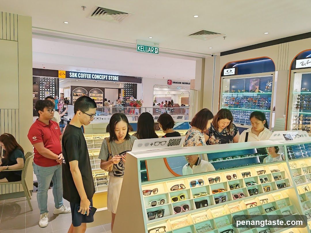 Optical Shop Interior with Customers Browsing Glasses