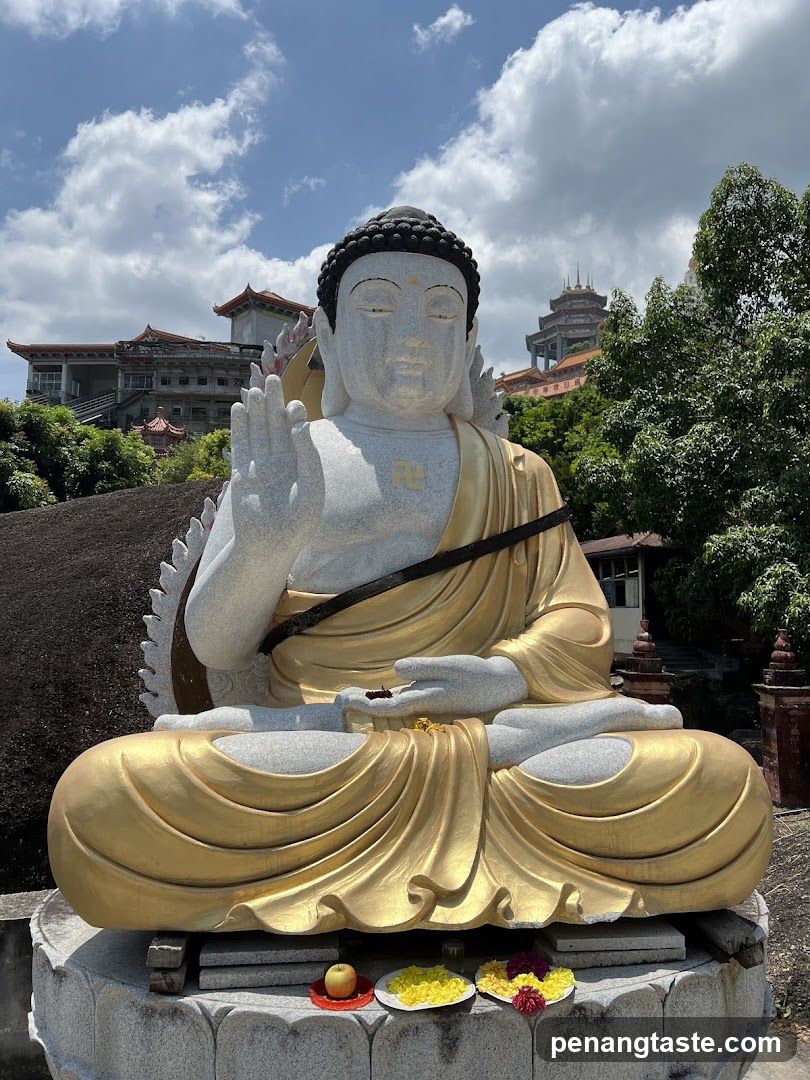 Buddha Statue with Offerings