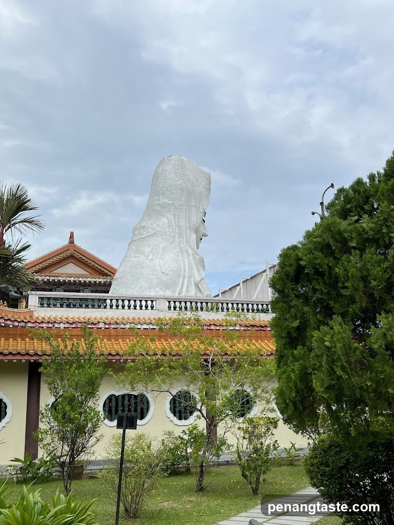 Giant White Statue at Temple Complex