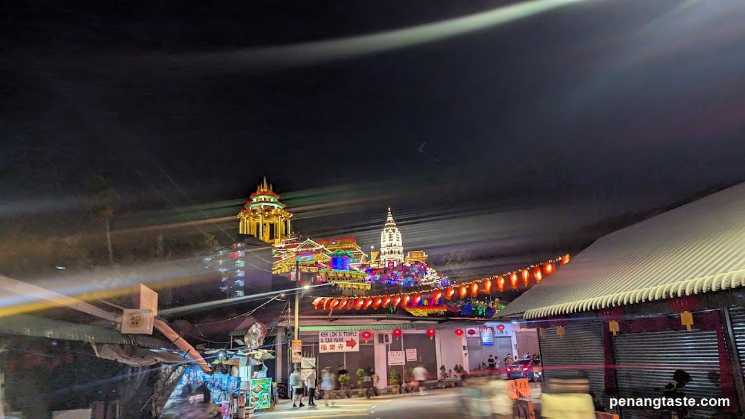 Night Market Scene with Temple Lights