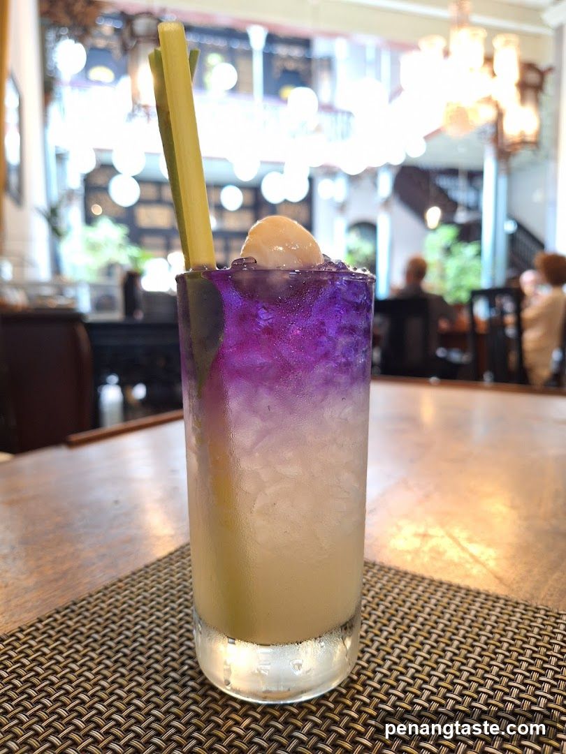 Purple layered cocktail in glass
