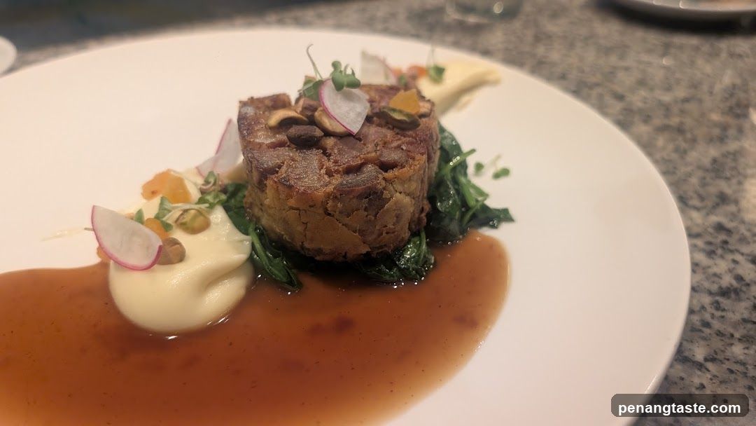 Plated Steak with Greens and Sauce