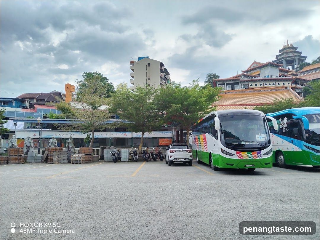 Bus Parking Lot with Temple Background