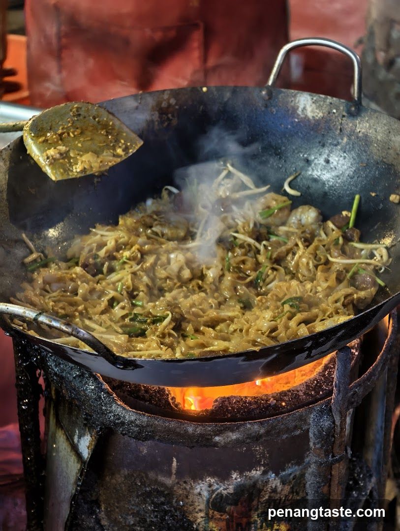 Stir-fried noodles in a wok