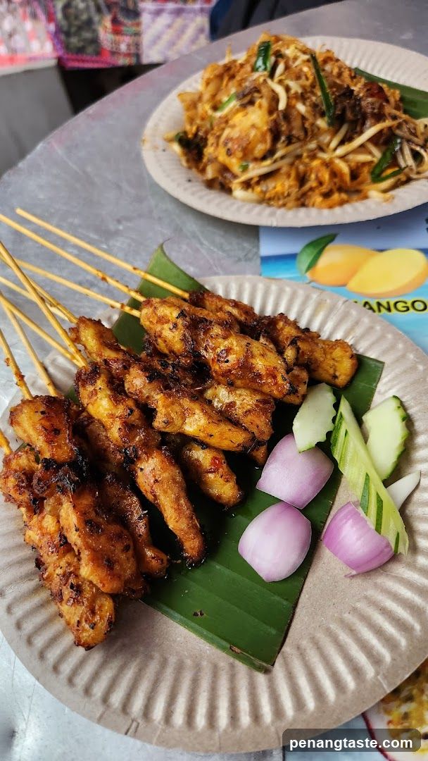 Street Food Plate with Satay and Fried Rice