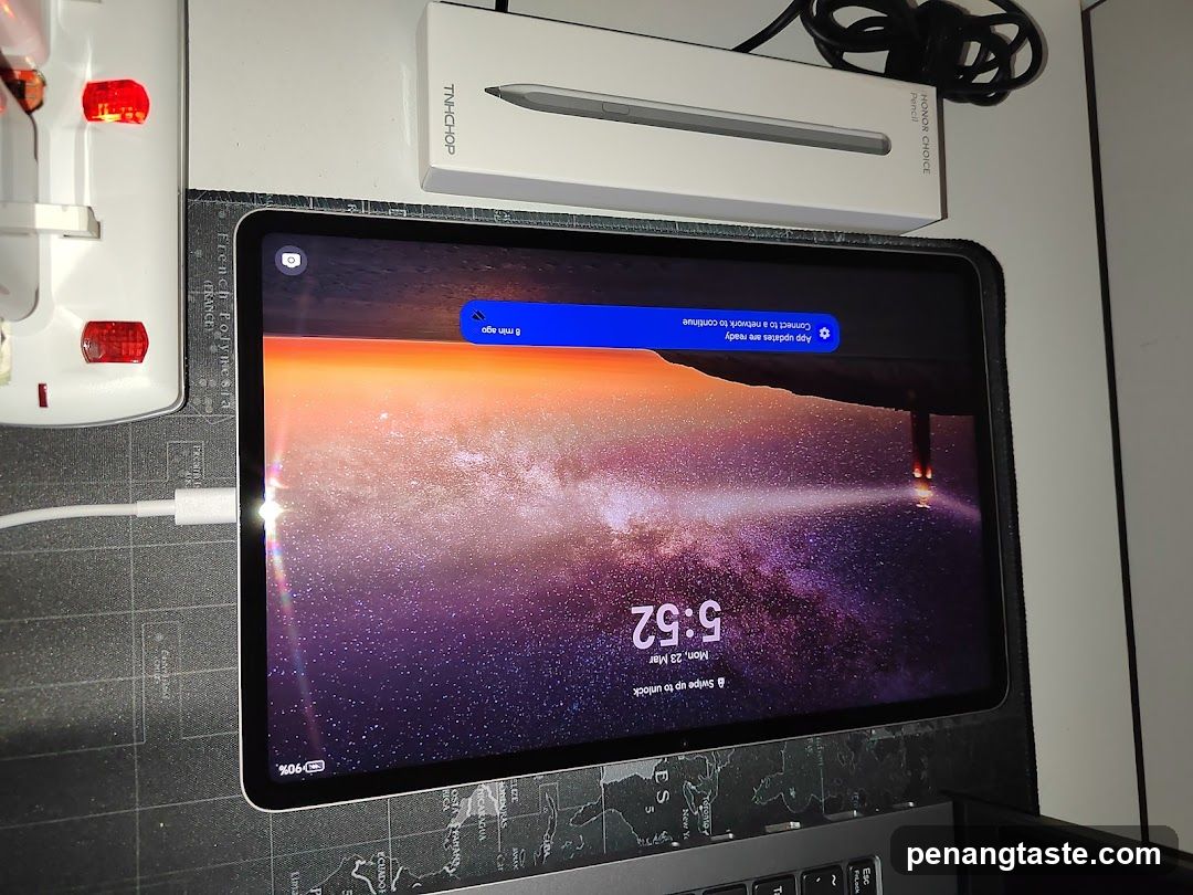 Tablet on desk with stylus box