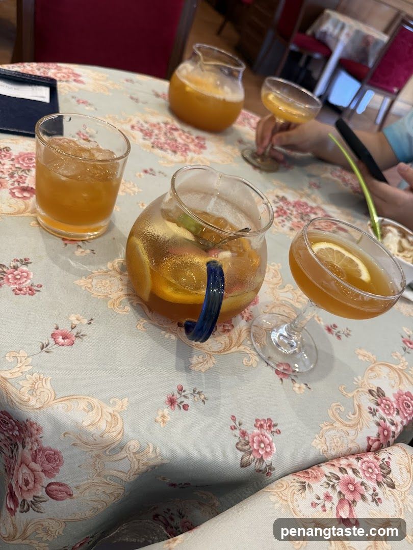 Tea and Lemonade on Floral Tablecloth