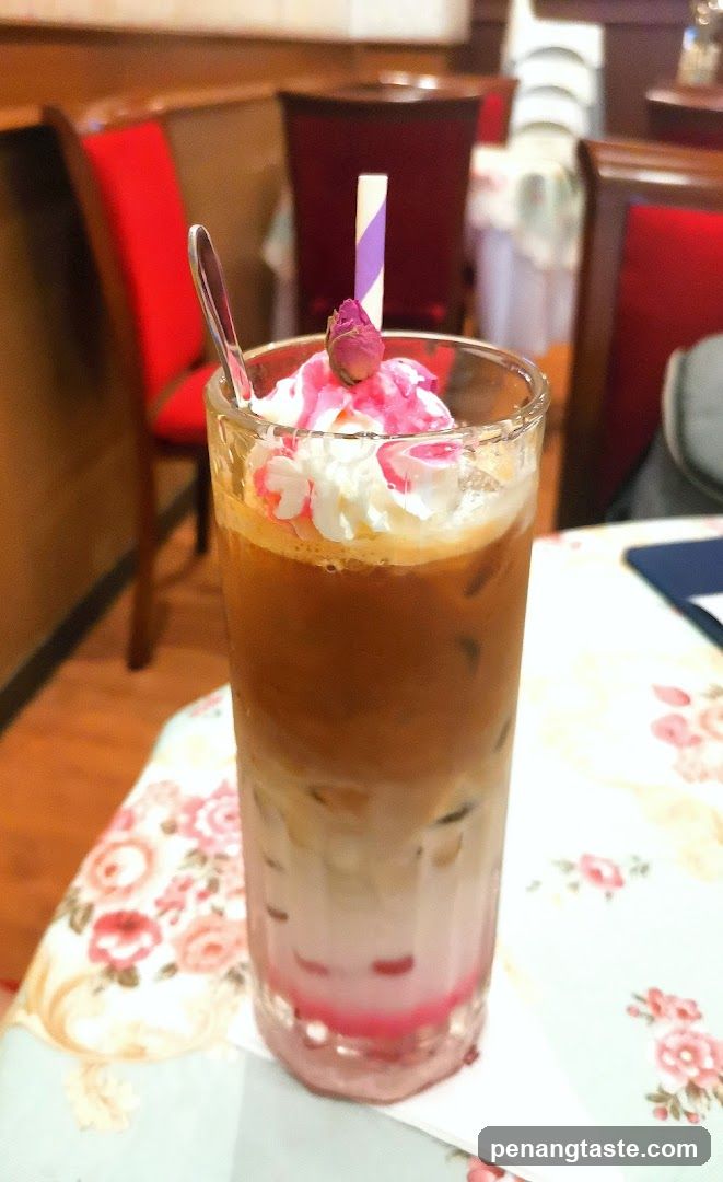 Iced Coffee with Whipped Cream and Rose Petal