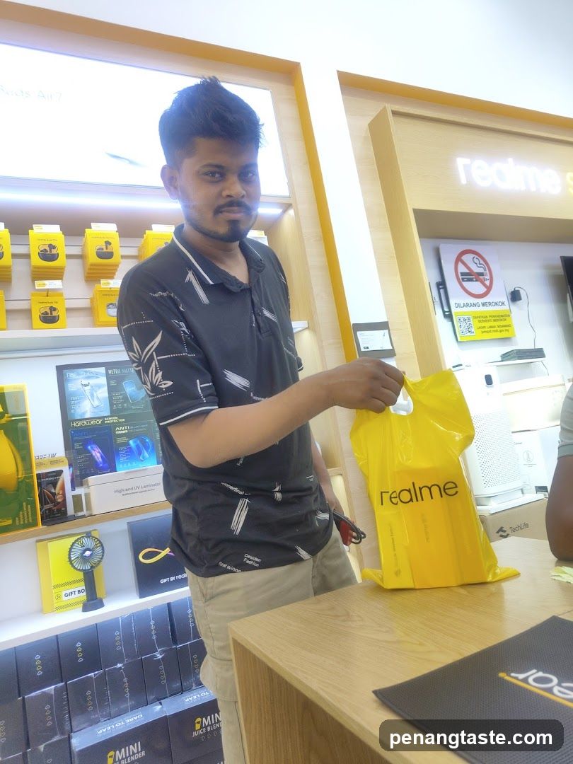 Customer holding yellow bag in store