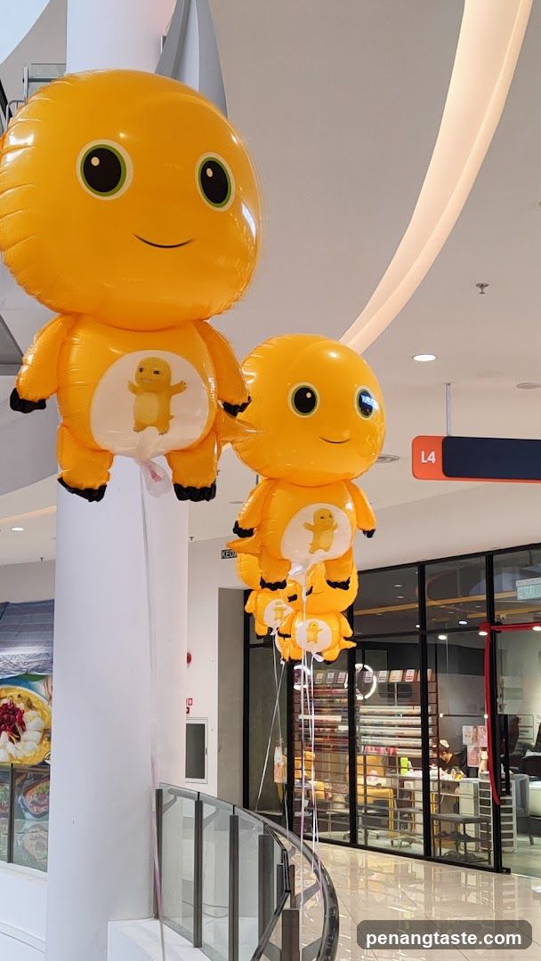 Orange Character Balloons in Mall