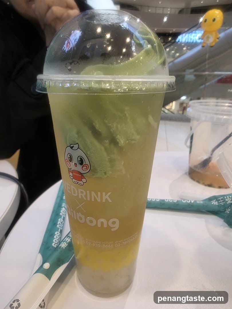 Brewed Drink Cup with Green Tea and Mango