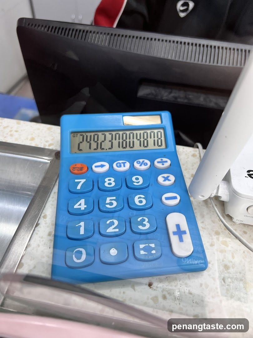Blue Calculator on Counter