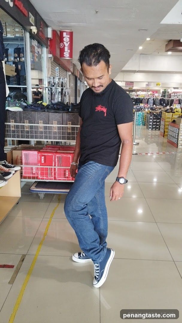 Man in Shoe Store Aisle