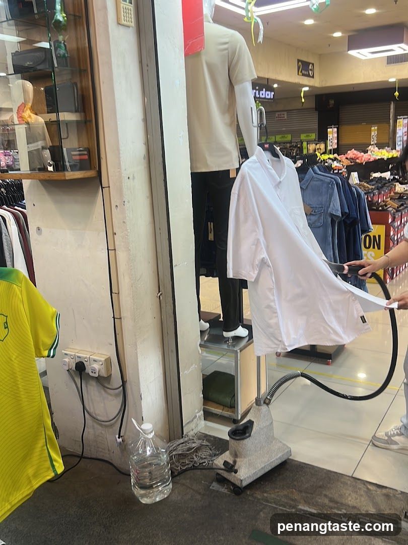 Clothing Store Interior with Steam Ironing