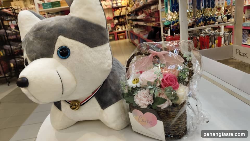 Stuffed Husky and Flower Basket Display