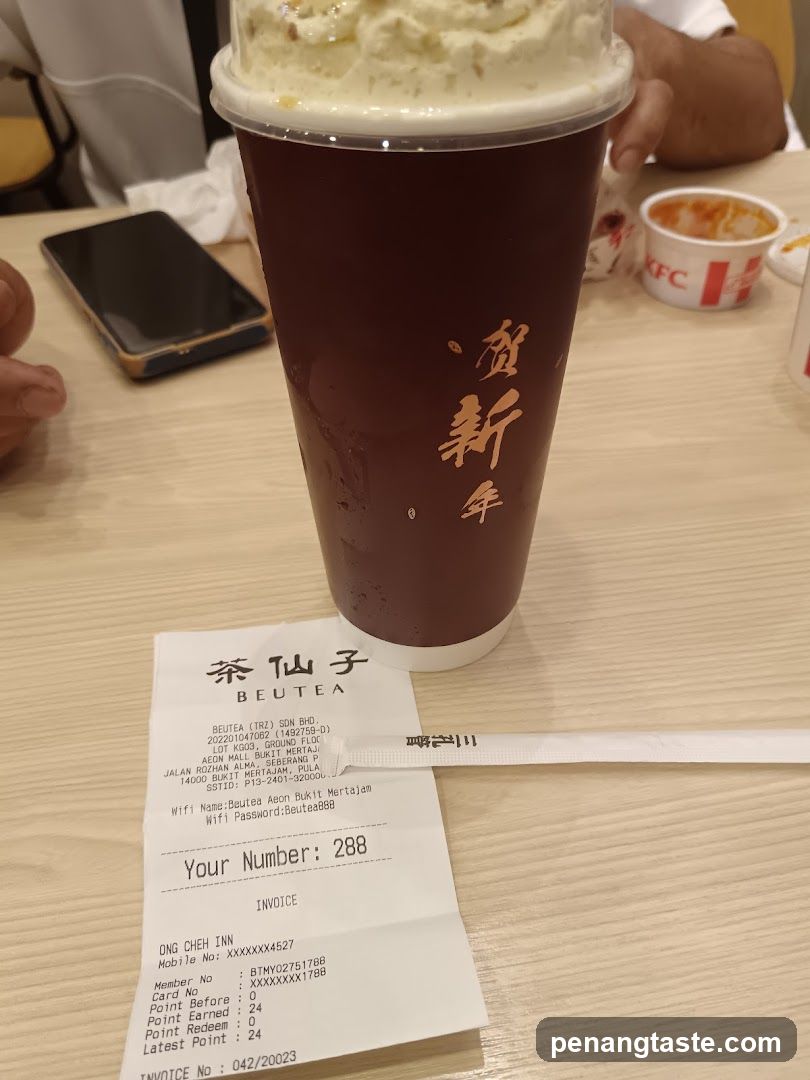 Beverage and receipt on table