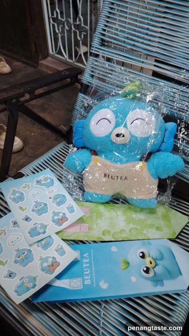 Blue plush toy and merchandise display