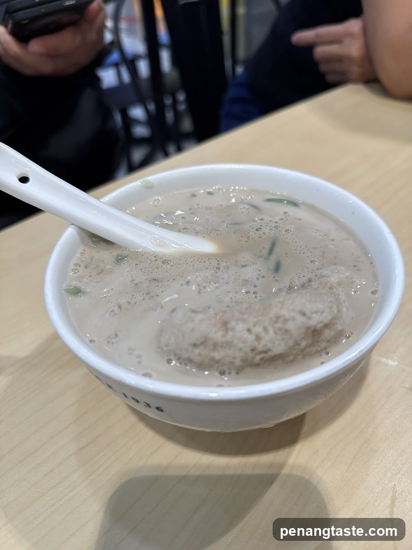 Bowl of Soup with Spoon