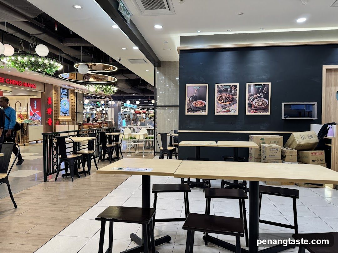Food Court Interior with Dining Tables and Decorative Lighting
