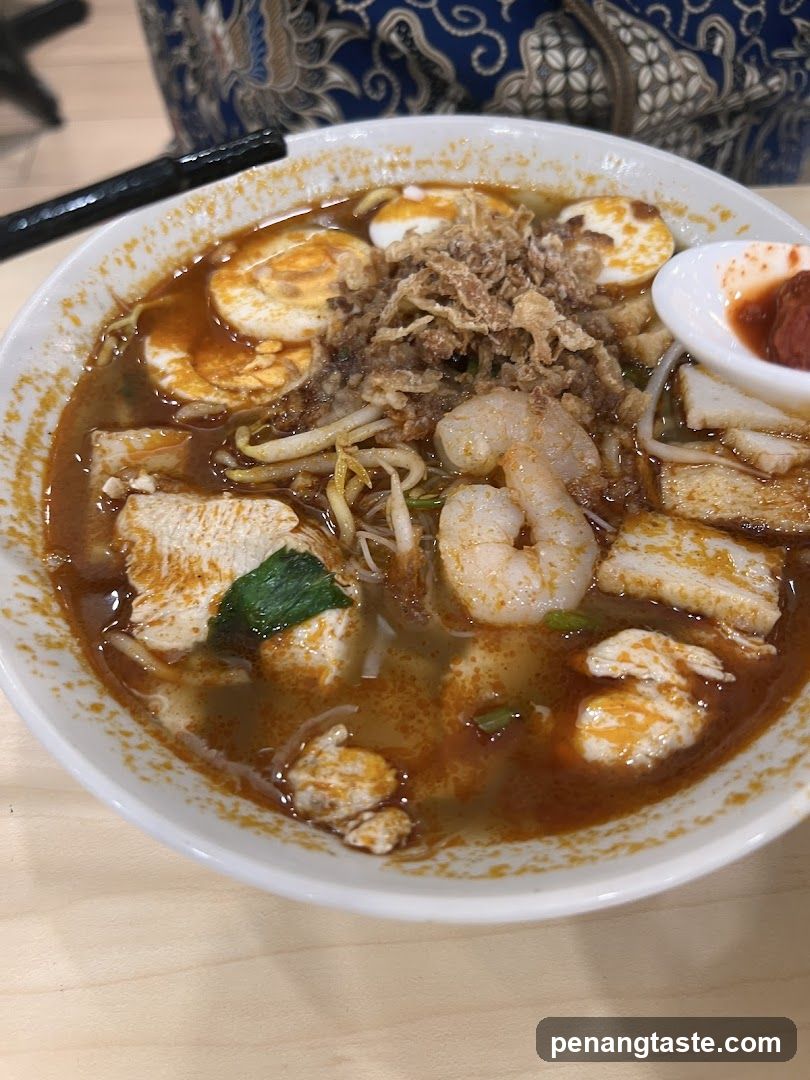 Bowl of Spicy Noodle Soup with Shrimp and Tofu