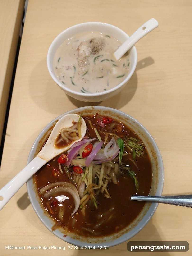 Bowl of spicy noodle soup and creamy soup
