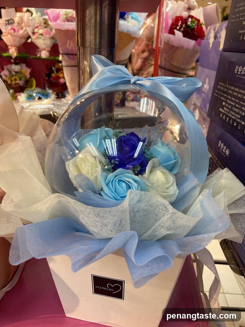 Blue and White Flower Bouquet in Clear Sphere