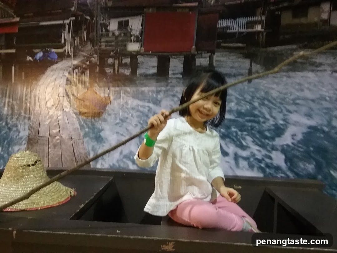Girl Fishing in a Boat Display