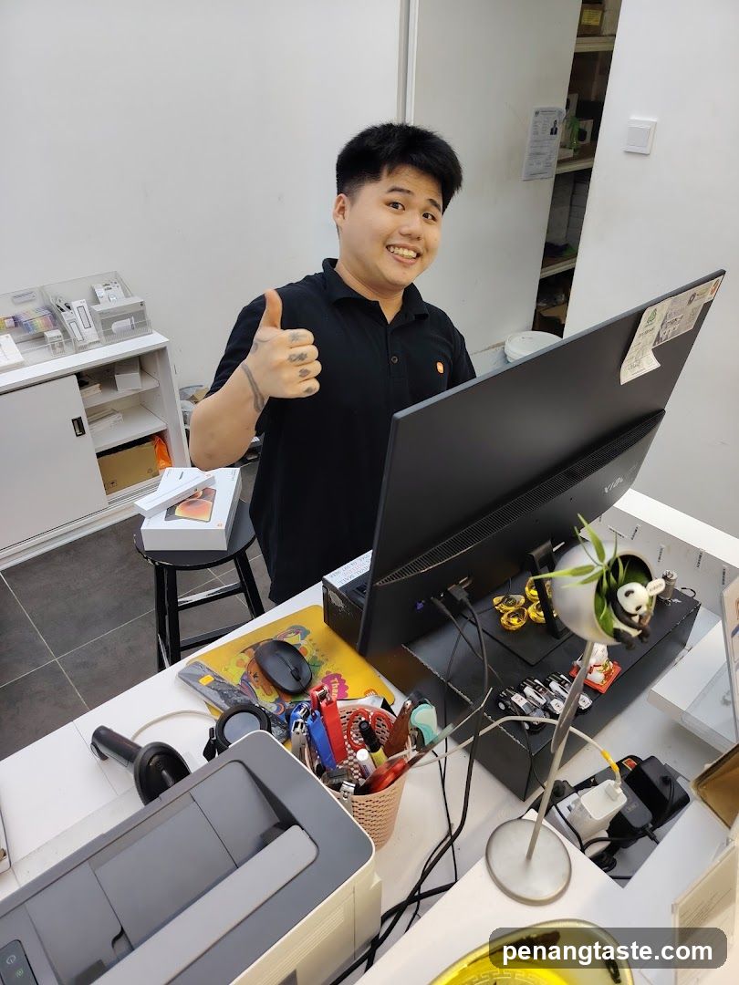 Staff at a desk in an office or shop interior