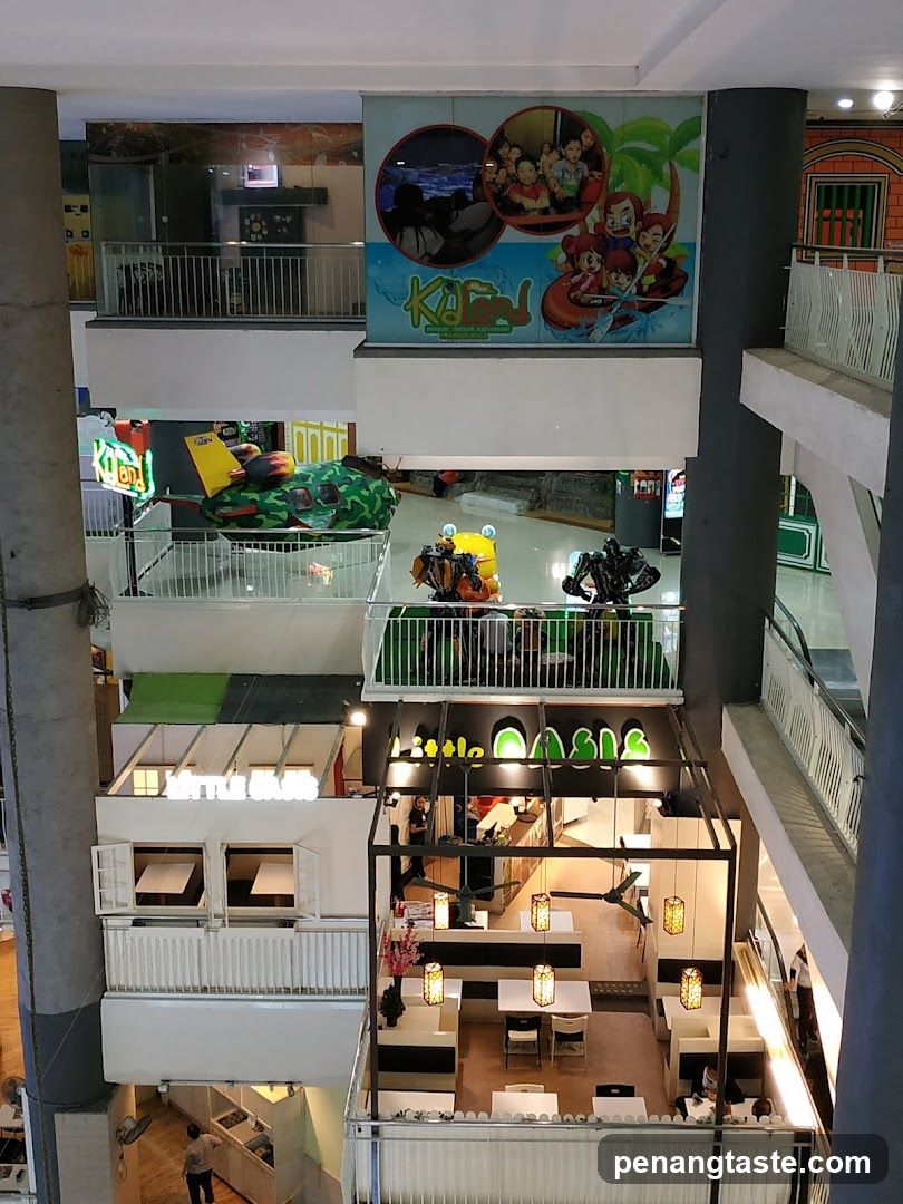 Multi-level Mall Interior with Decorative Installations and Dining Areas