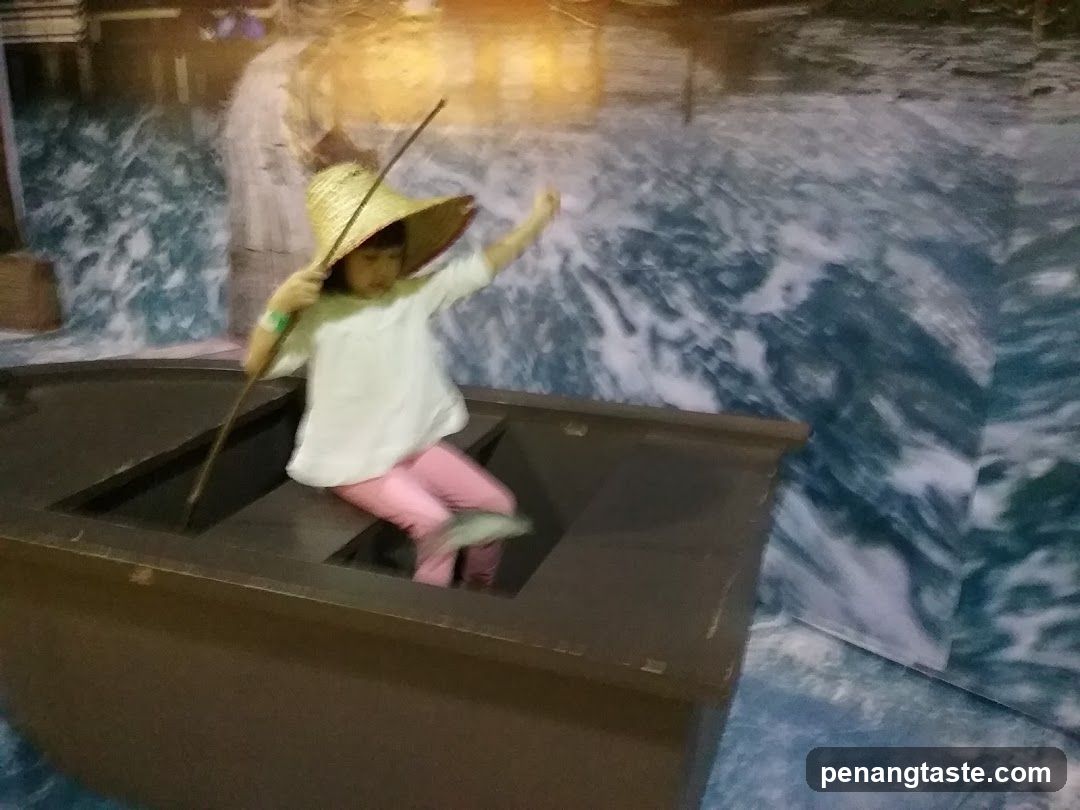 Child in a boat exhibit