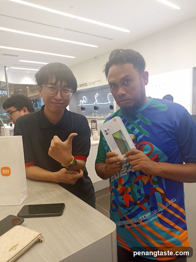 Two men in electronics store