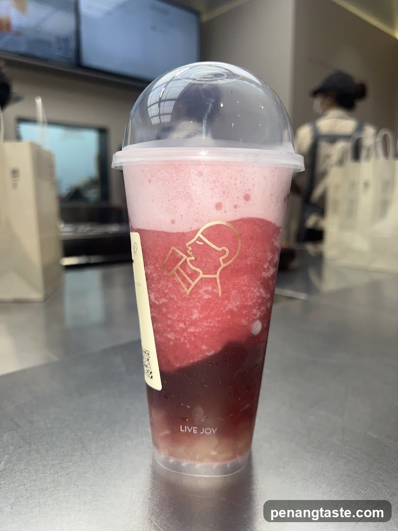 Beverage with layered drink in cup