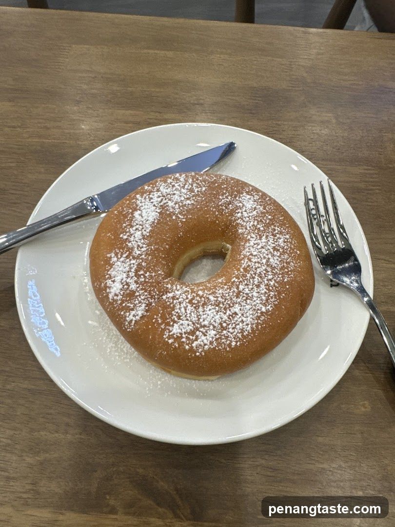 Powdered Donut on Plate
