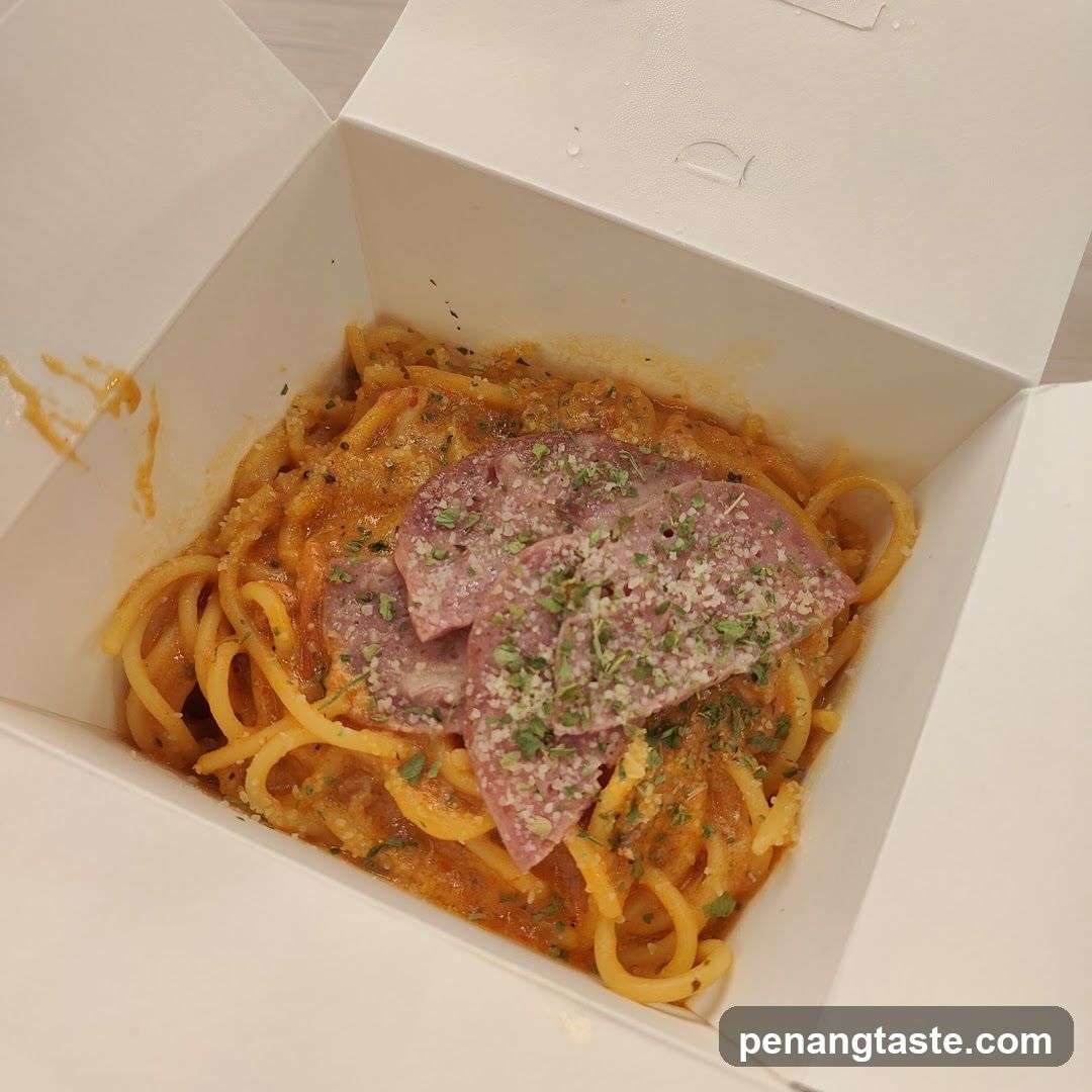 Spaghetti with Meat Slices in Takeout Box