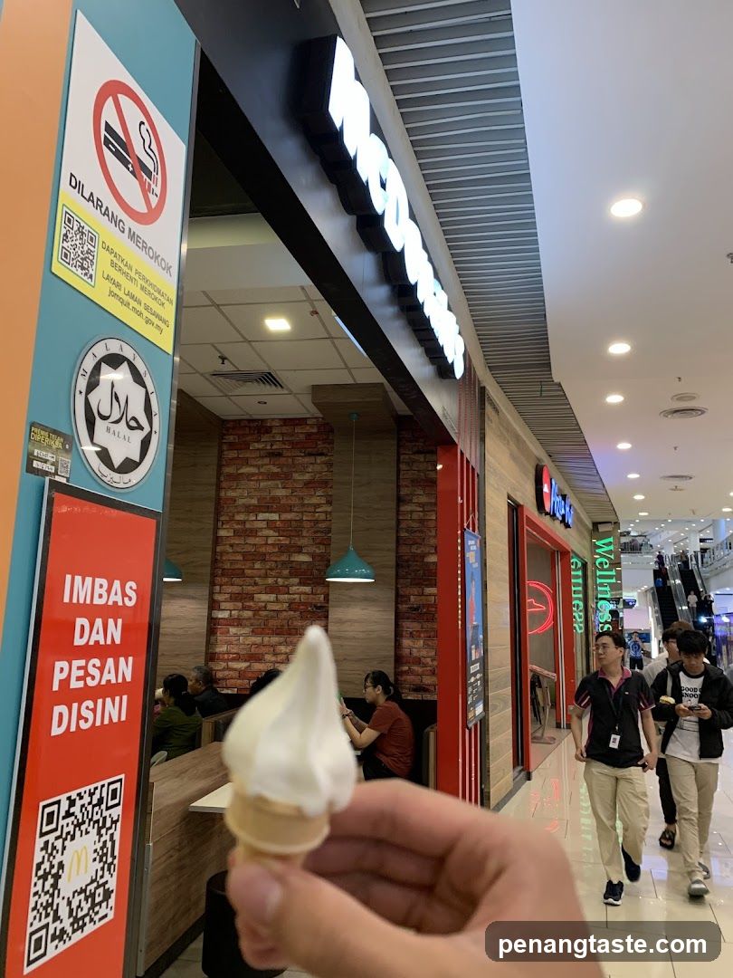 Ice cream cone in mall corridor