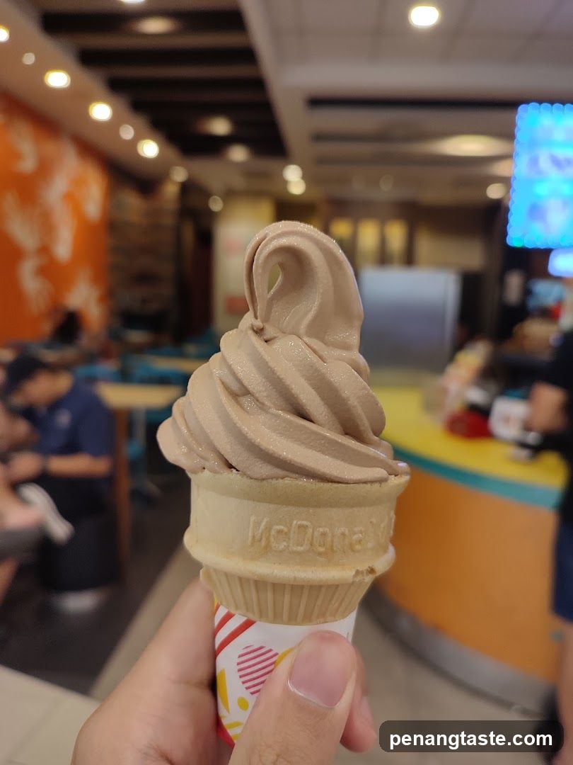 Soft-serve ice cream cone in a mall food court