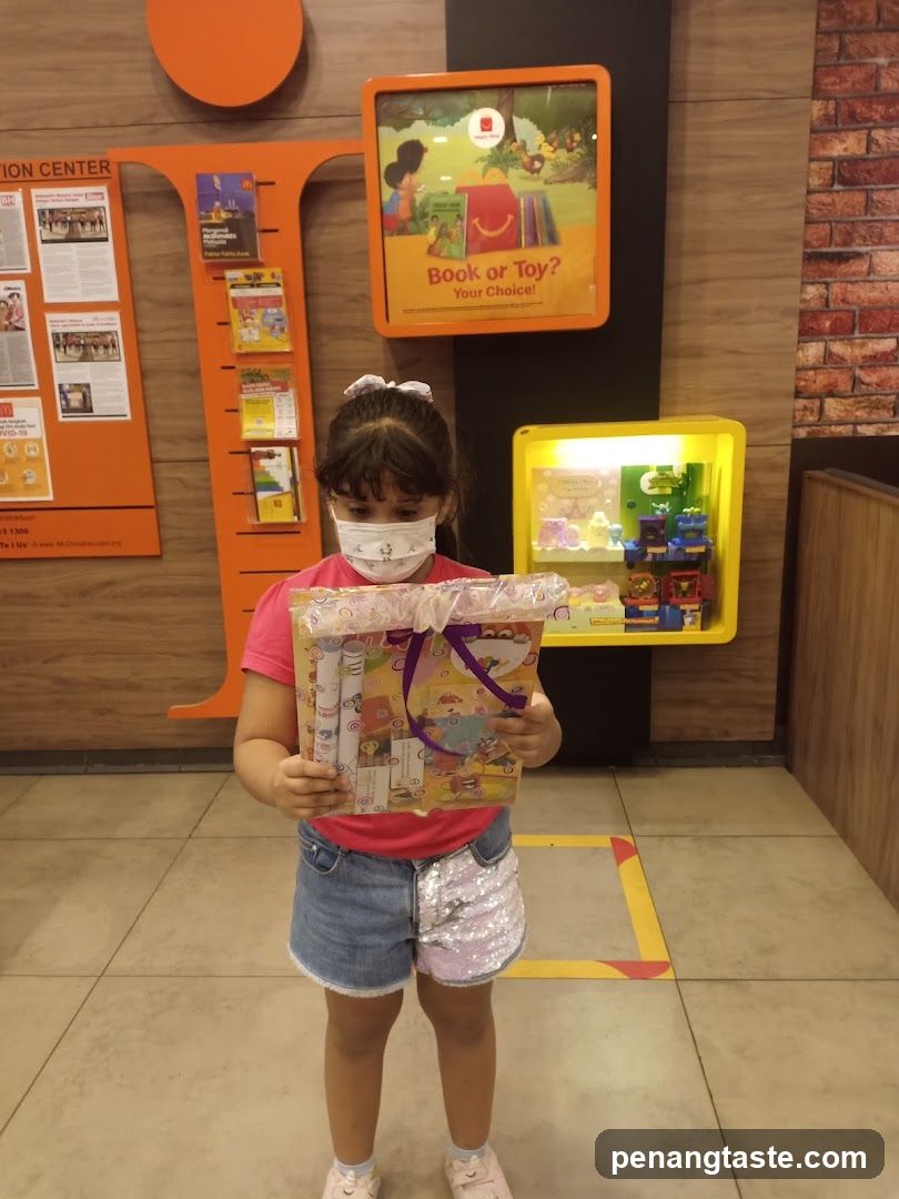 Girl Holding Gift Bag in Store Interior